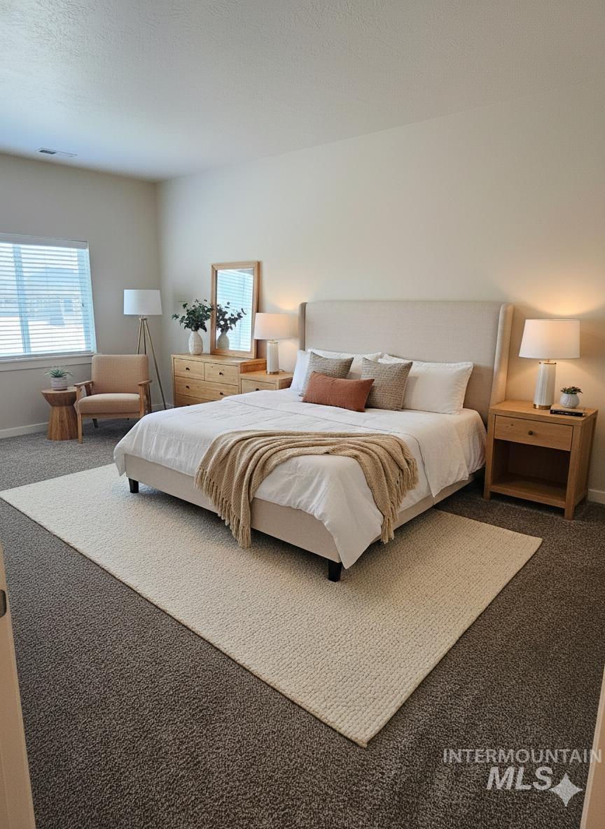 324 Northwest 3rd Street Meridian, ID 83642 - Photo 11 of 13 Bedroom featuring carpet flooring and baseboards
