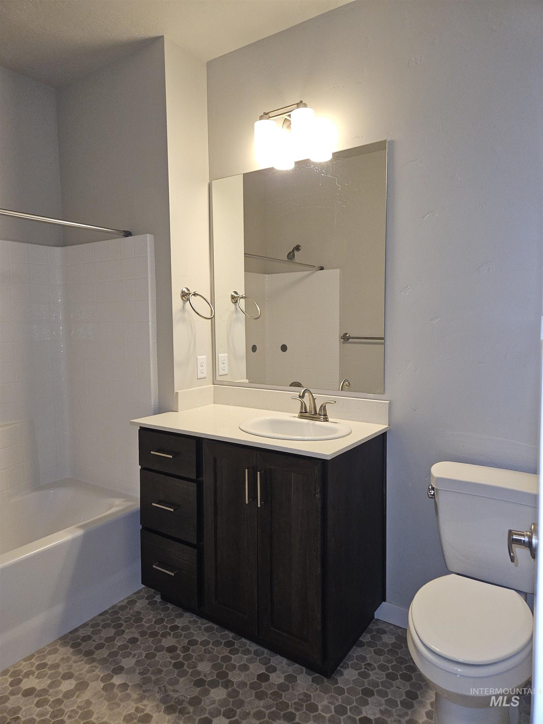 324 Northwest 3rd Street Meridian, ID 83642 - Photo 13 of 13 Bathroom with vanity and tub / shower combination