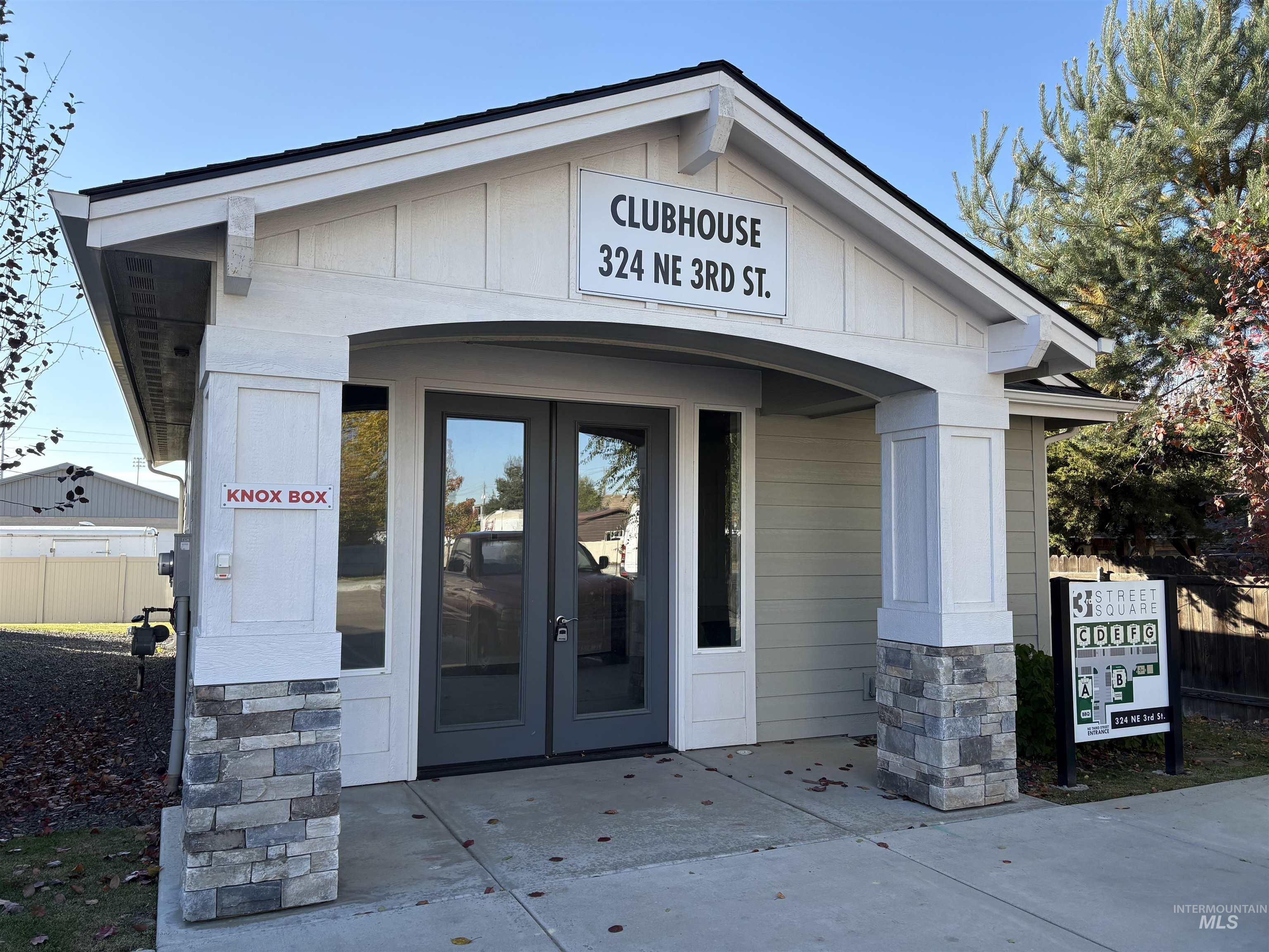 324 Northwest 3rd Street Meridian, ID 83642 - Photo 6 of 12 Entrance to property featuring french doors and stone siding
