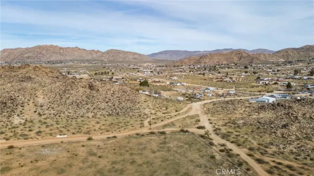 a view of ocean and mountain