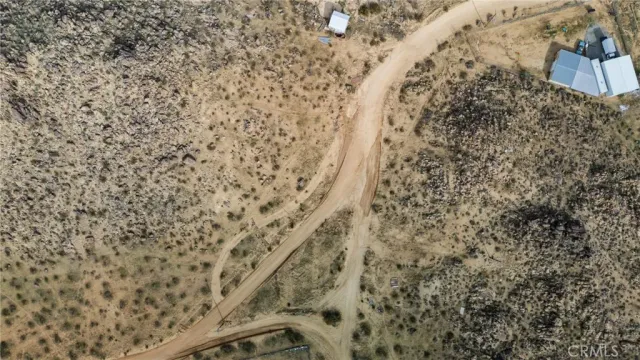 a view of ocean and mountain