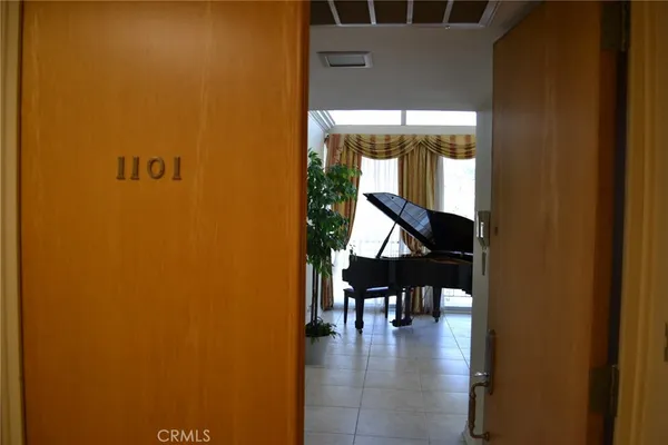 a view of dining room with furniture and window