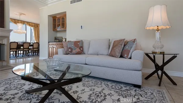 a living room with furniture and a table