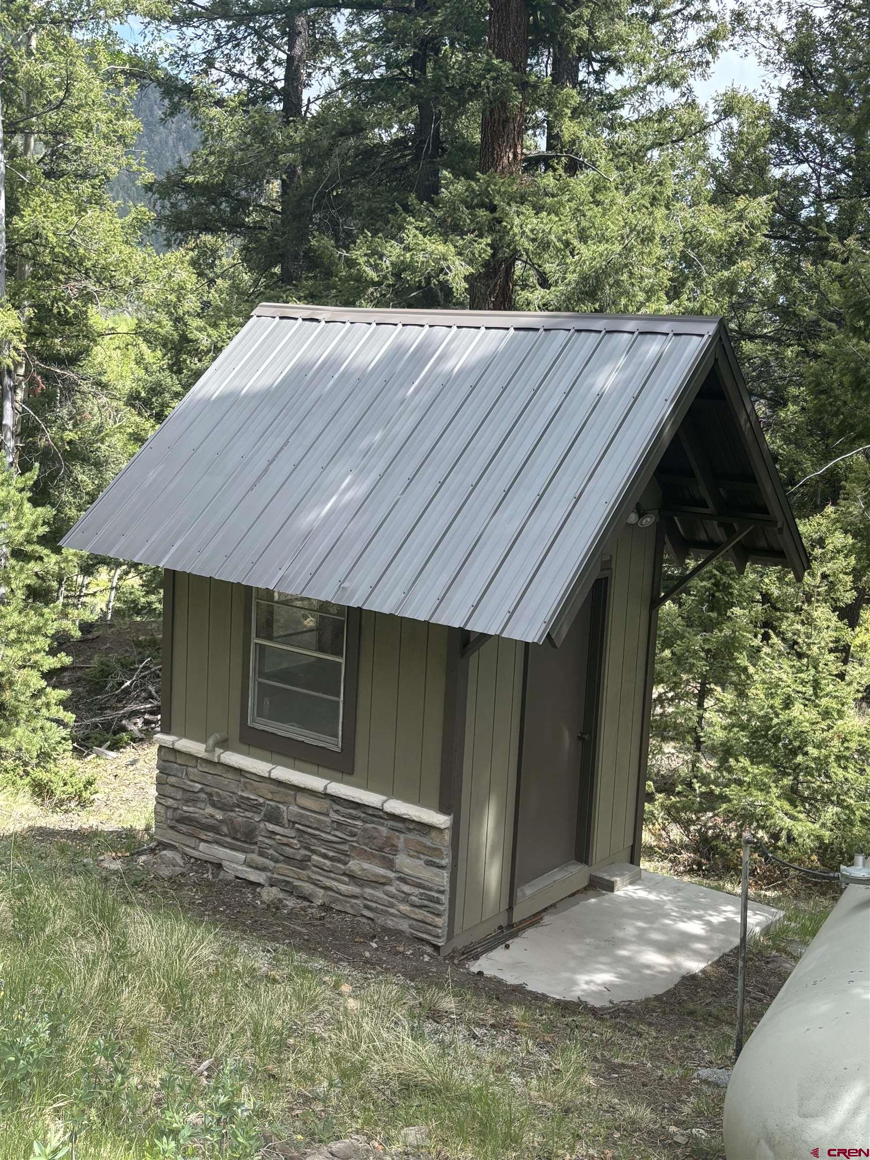 1113 Spring Street Del Norte, CO 81132 - Photo 41 of 43 a backyard of a house