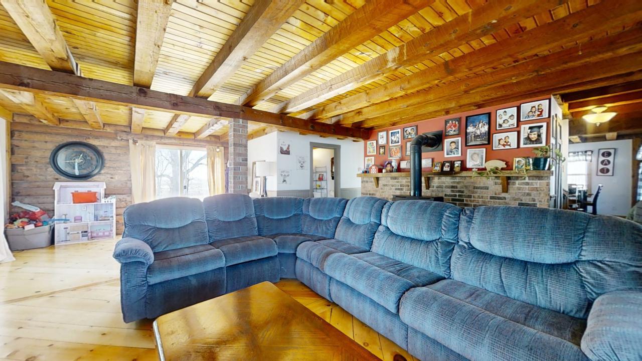 5764 200 North Road Sidell, IL 61876 - Photo 7 of 46 a living room with furniture and a large window