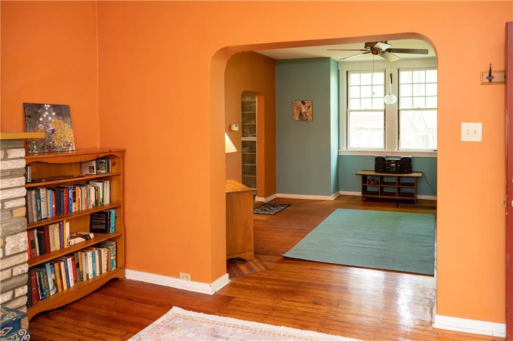 124 Elmore Road Pittsburgh, PA 15221 - Photo 11 of 29 a living room with a book shelf