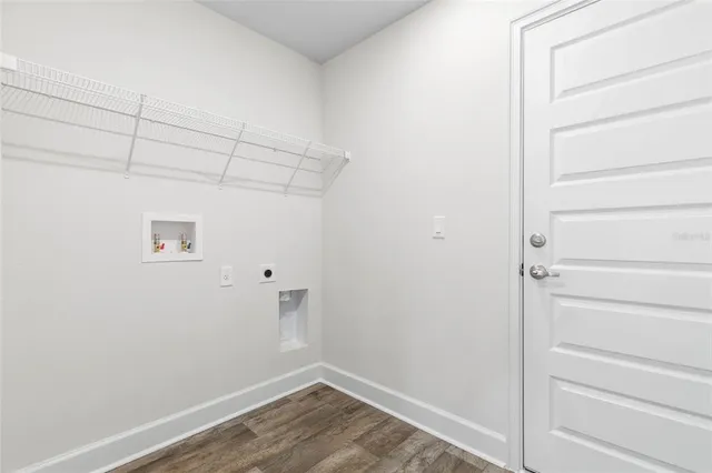 a view of yellow house with a yard