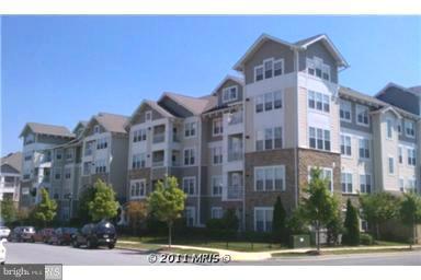 12824 Clarksburg Square Road, Unit 208 Clarksburg, MD 20871 - Photo 1 of 20 a front view of a building