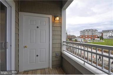 12824 Clarksburg Square Road, Unit 208 Clarksburg, MD 20871 - Photo 4 of 20 a view of city from a balcony
