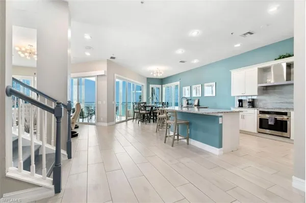 a view of a dining room with furniture window and outside view