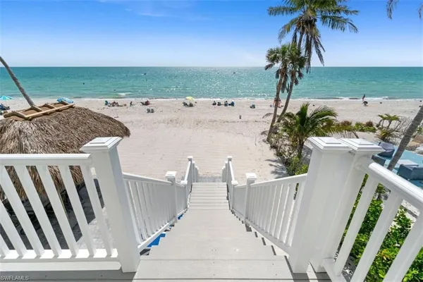 a view of a terrace with wooden fence