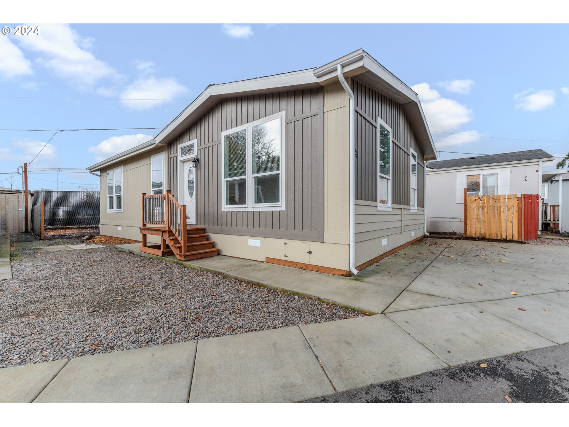 9700 Southwest Tualatin Road, Unit 22 Tualatin, OR 97062 - Photo 30 of 30 a view of a house with a backyard