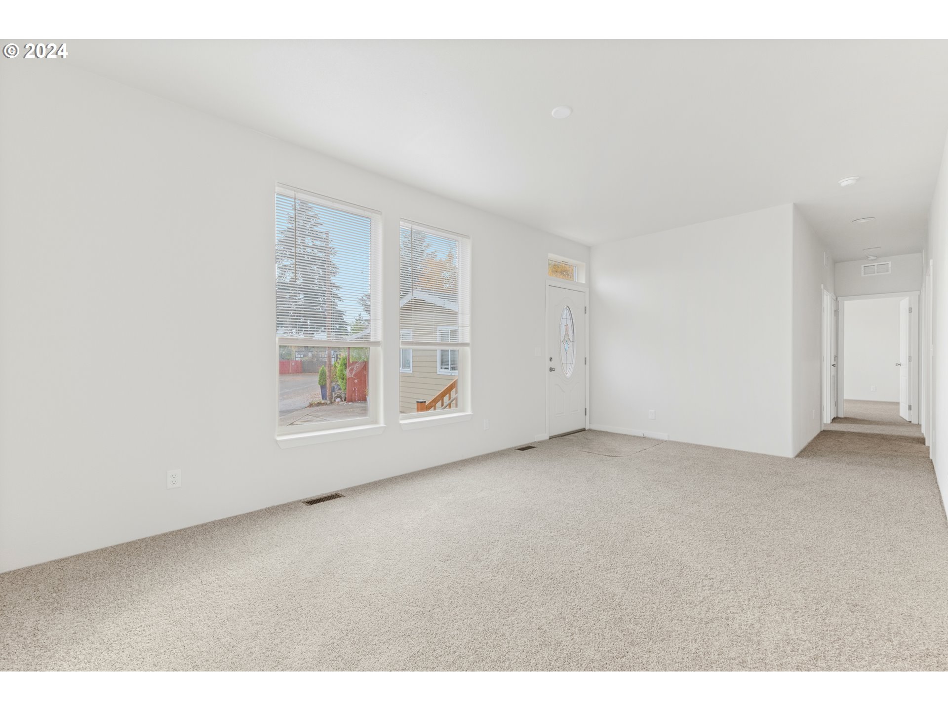 9700 Southwest Tualatin Road, Unit 22 Tualatin, OR 97062 - Photo 4 of 30 a view of an empty room with a window