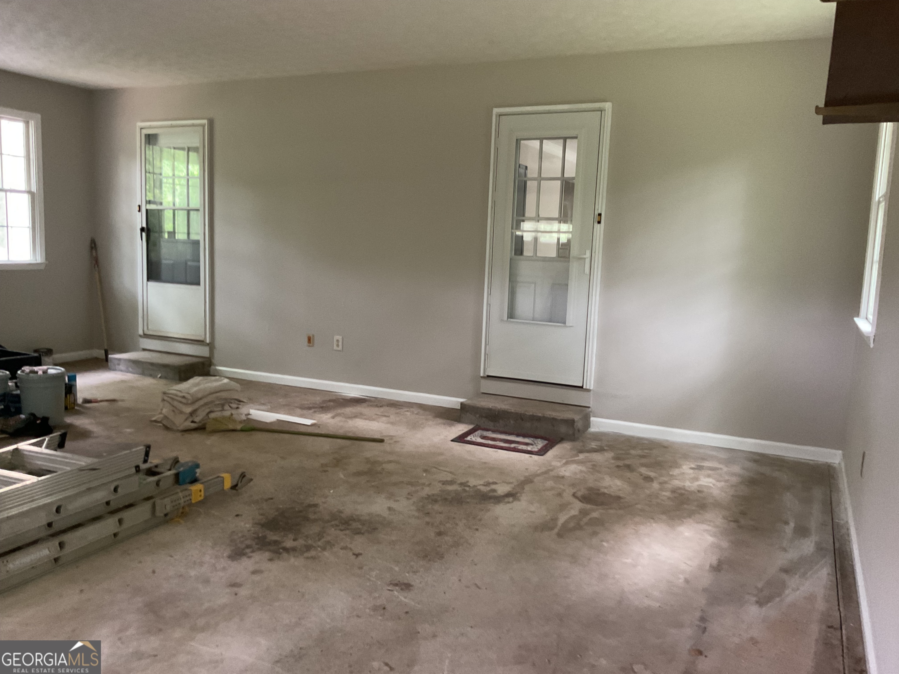 4800 Bethlehem Road Fairburn, GA 30213 - Photo 49 of 49 an empty room with windows