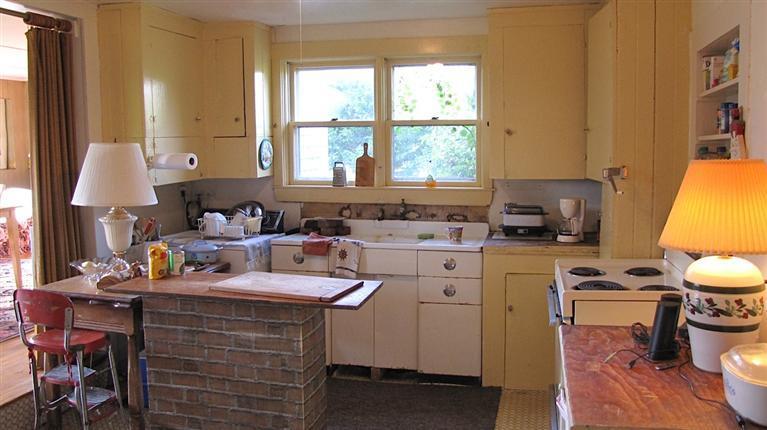 4 Pond Road, Unit 1 2 3 Truro, MA 02666 - Photo 12 of 19 a kitchen with a sink cabinets and a window