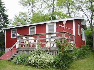 4 Pond Road, Unit 1 2 3 Truro, MA 02666 - Photo 17 of 19 a backyard of a house with lots of green space