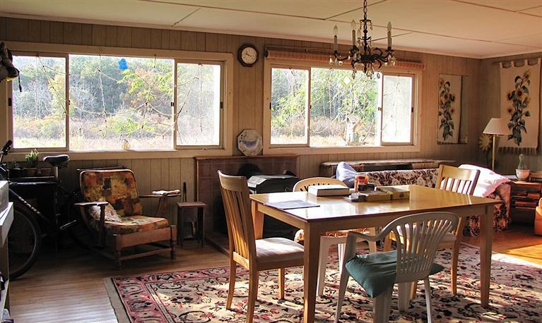 4 Pond Road, Unit 1 2 3 Truro, MA 02666 - Photo 10 of 19 a view of a dining room with furniture window and outside view