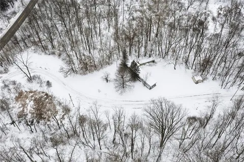a view of snow on the road