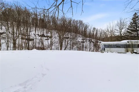 a view of road with trees