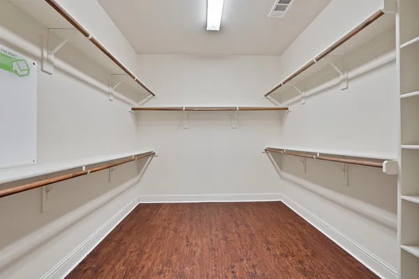 a view of an empty walk in closet