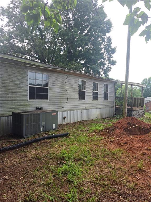 749 Chambers Road Commerce, GA 30530 - Photo 3 of 13 a backyard of a house