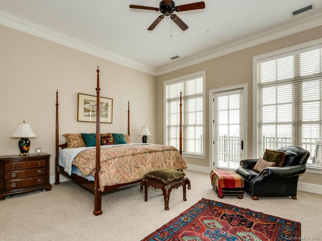 2823 Providence Road, Unit 180 Charlotte, NC 28211 - Photo 14 of 24 a bedroom with bed couch and window