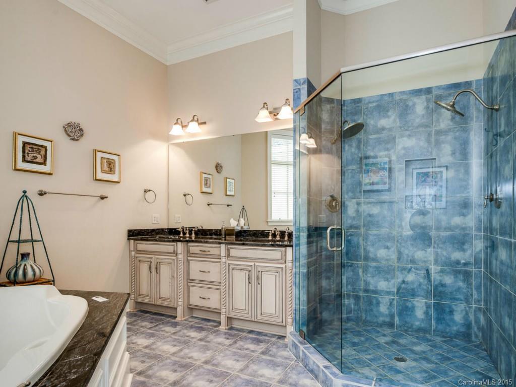 2823 Providence Road, Unit 180 Charlotte, NC 28211 - Photo 16 of 24 a bathroom with a bathtub and a sink