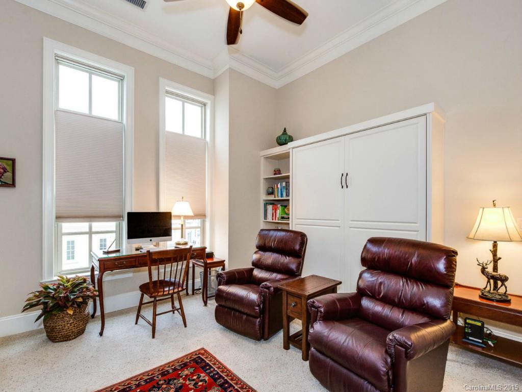 2823 Providence Road, Unit 180 Charlotte, NC 28211 - Photo 19 of 24 a living room with furniture ceiling fan and a window