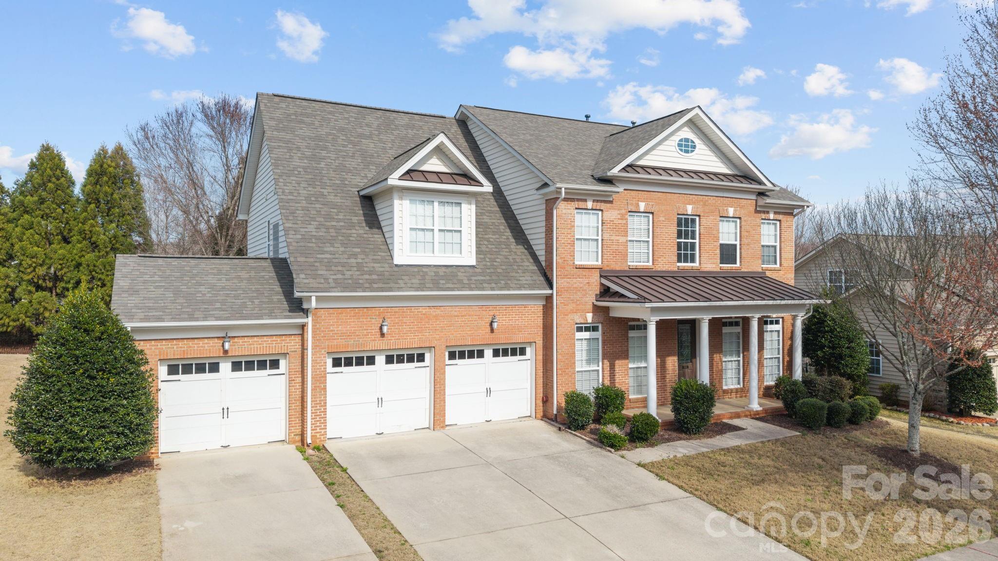 646 Quicksilver Trail Fort Mill, SC 29708 - Photo 2 of 48 a front view of a house with a yard