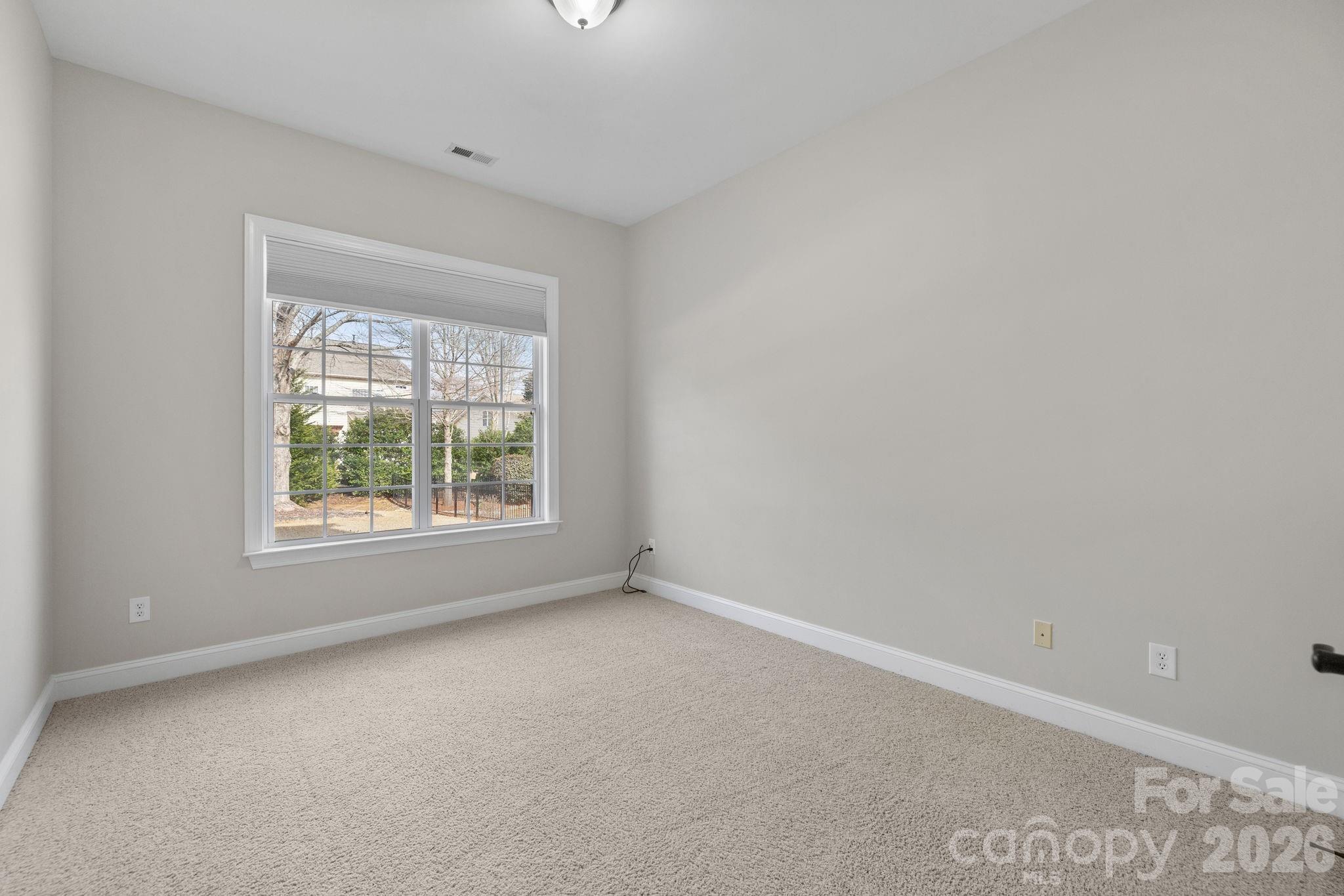 646 Quicksilver Trail Fort Mill, SC 29708 - Photo 21 of 48 an empty room with a window