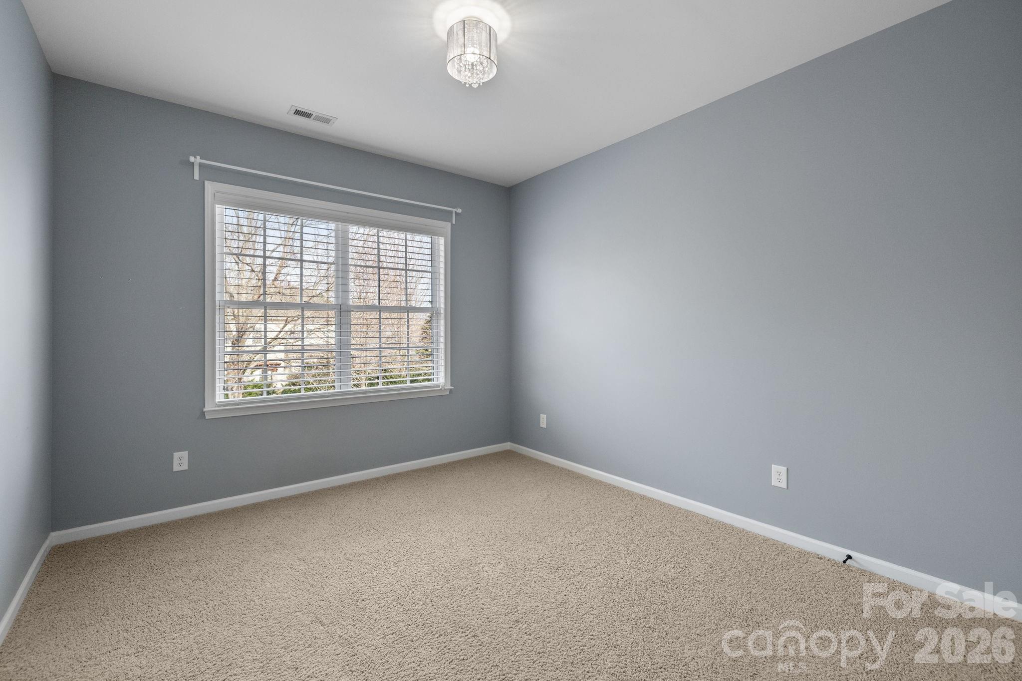 646 Quicksilver Trail Fort Mill, SC 29708 - Photo 25 of 48 an empty room with a window