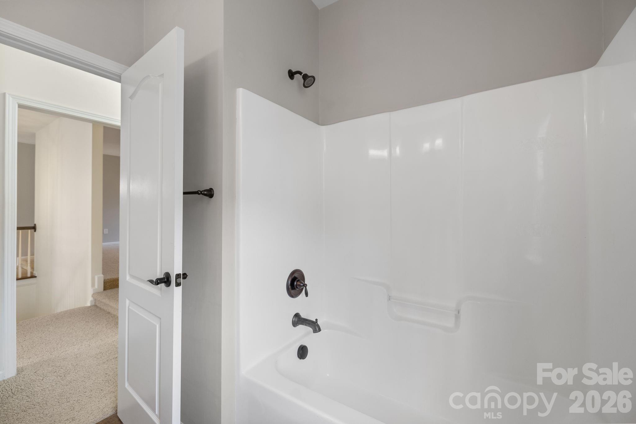 646 Quicksilver Trail Fort Mill, SC 29708 - Photo 28 of 48 a bathroom with a bathtub