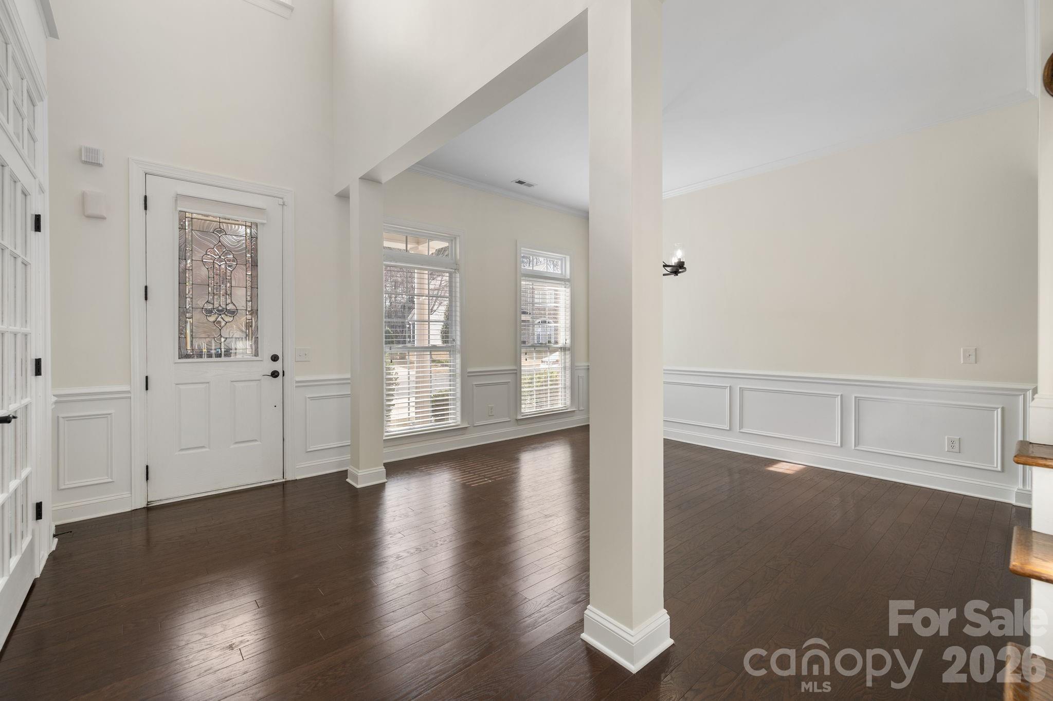 646 Quicksilver Trail Fort Mill, SC 29708 - Photo 3 of 48 wooden floor in an empty room with a window