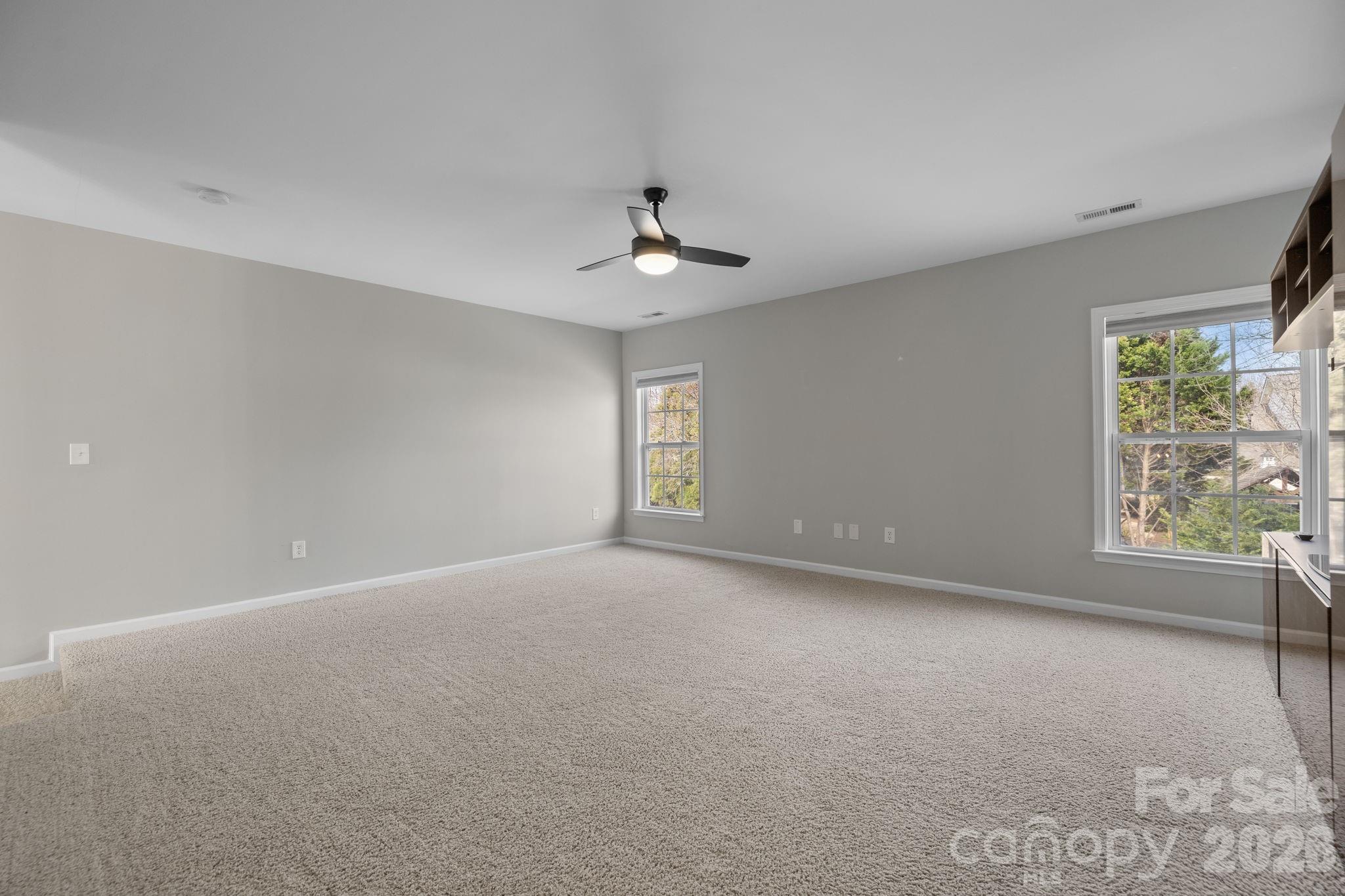 646 Quicksilver Trail Fort Mill, SC 29708 - Photo 31 of 48 a view of an empty room with a window