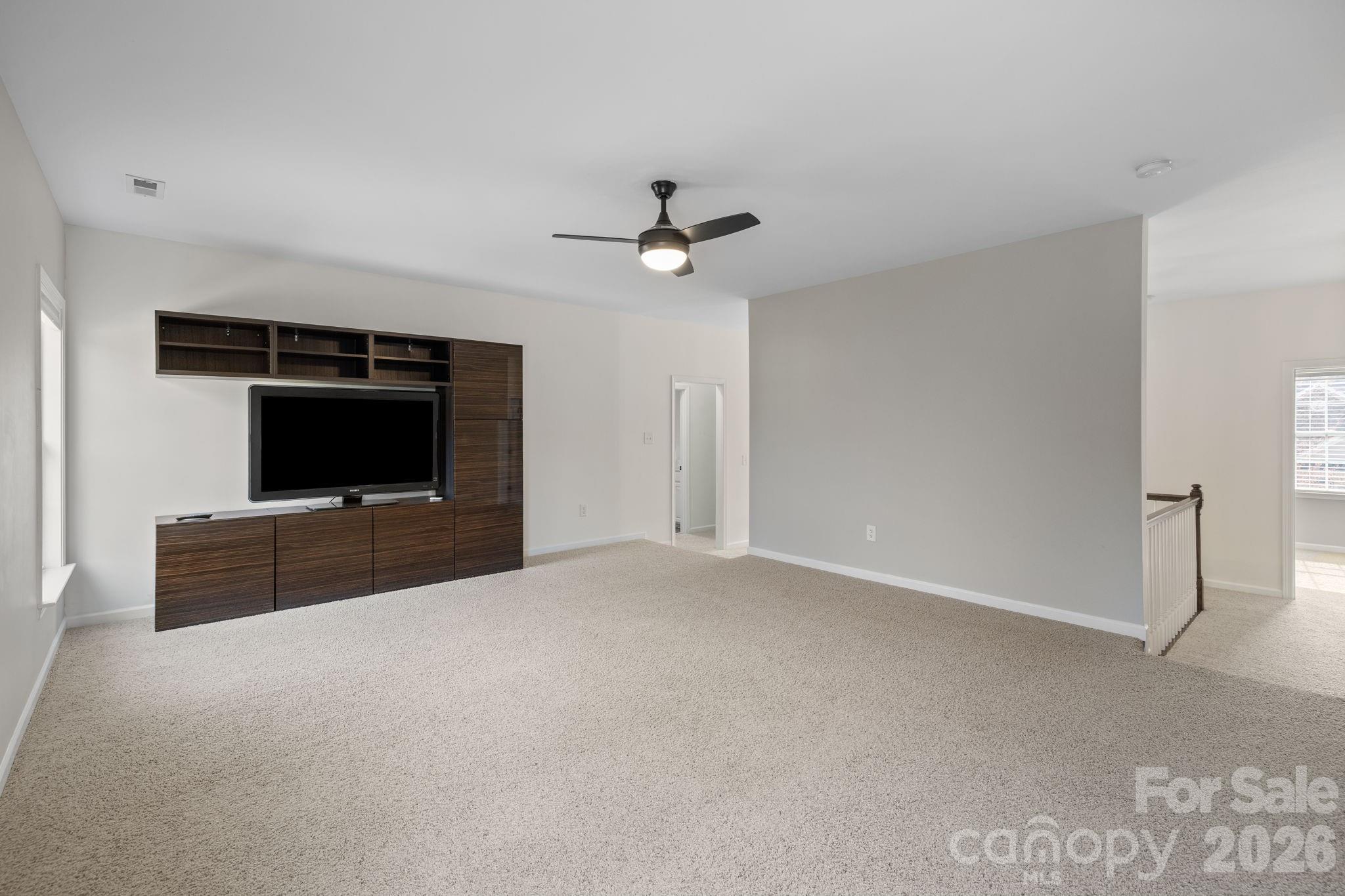 646 Quicksilver Trail Fort Mill, SC 29708 - Photo 32 of 48 a living room with furniture and a fireplace