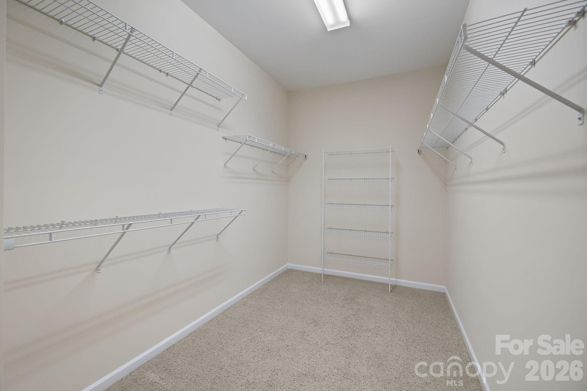 646 Quicksilver Trail Fort Mill, SC 29708 - Photo 38 of 48 a view of a room with racks on the wall