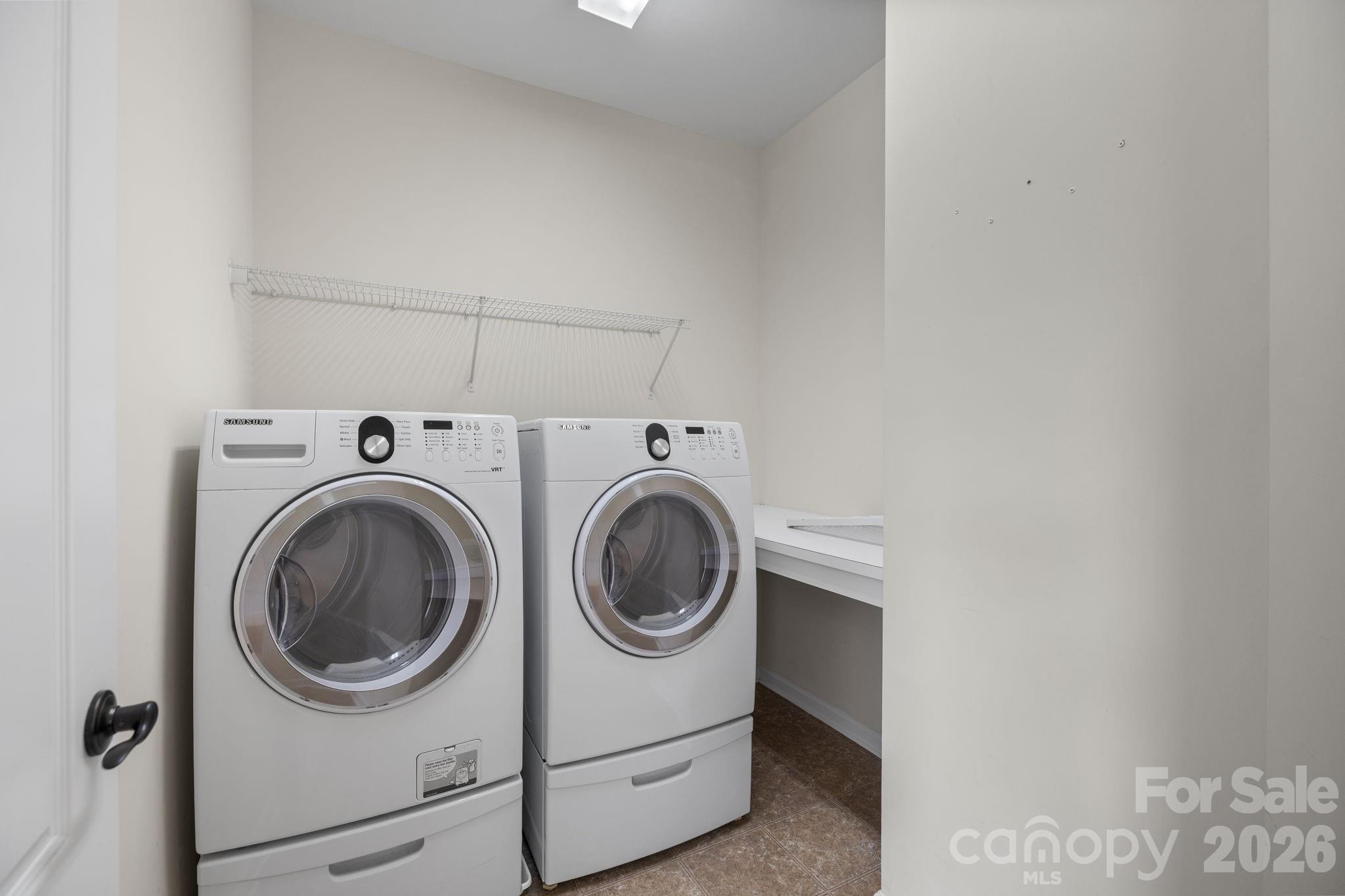 646 Quicksilver Trail Fort Mill, SC 29708 - Photo 39 of 48 a utility room with dryer and washer