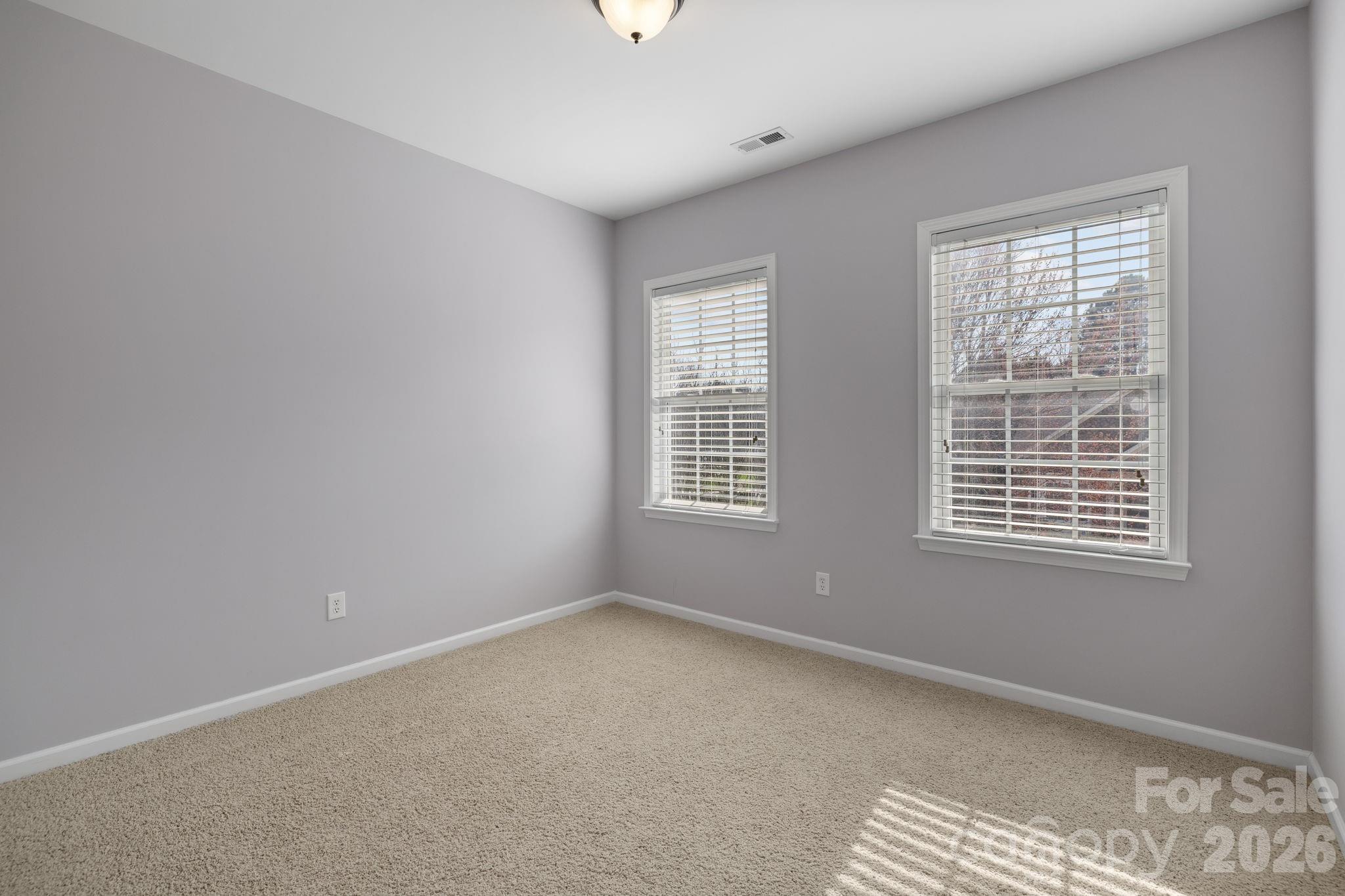 646 Quicksilver Trail Fort Mill, SC 29708 - Photo 40 of 48 a view of an empty room with a window