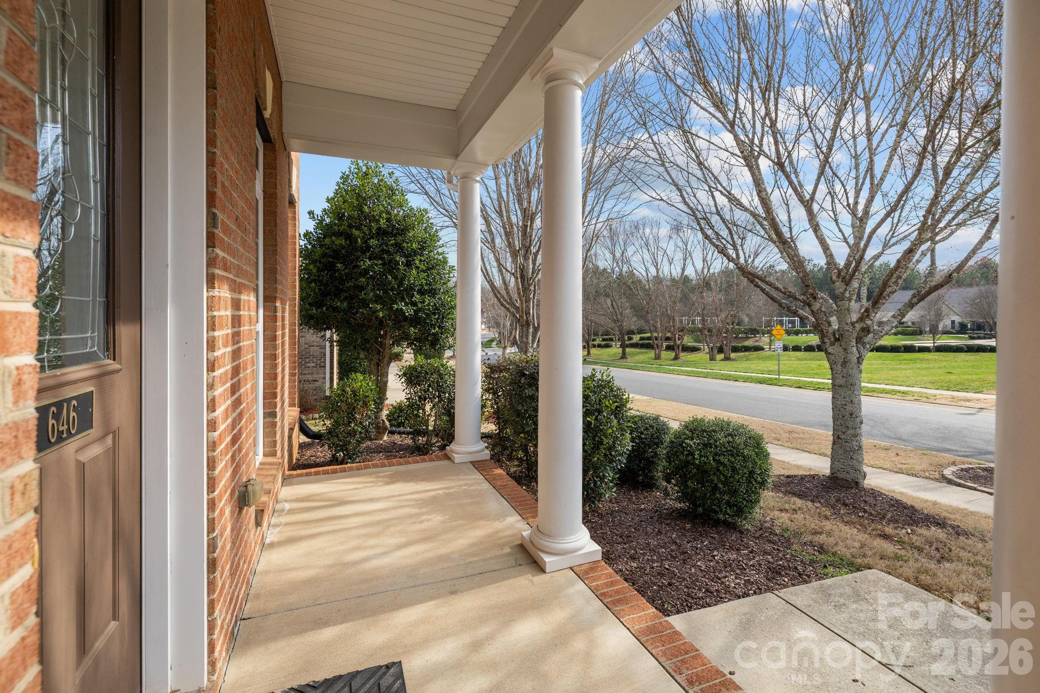 646 Quicksilver Trail Fort Mill, SC 29708 - Photo 43 of 48 a view of a porch with pathway