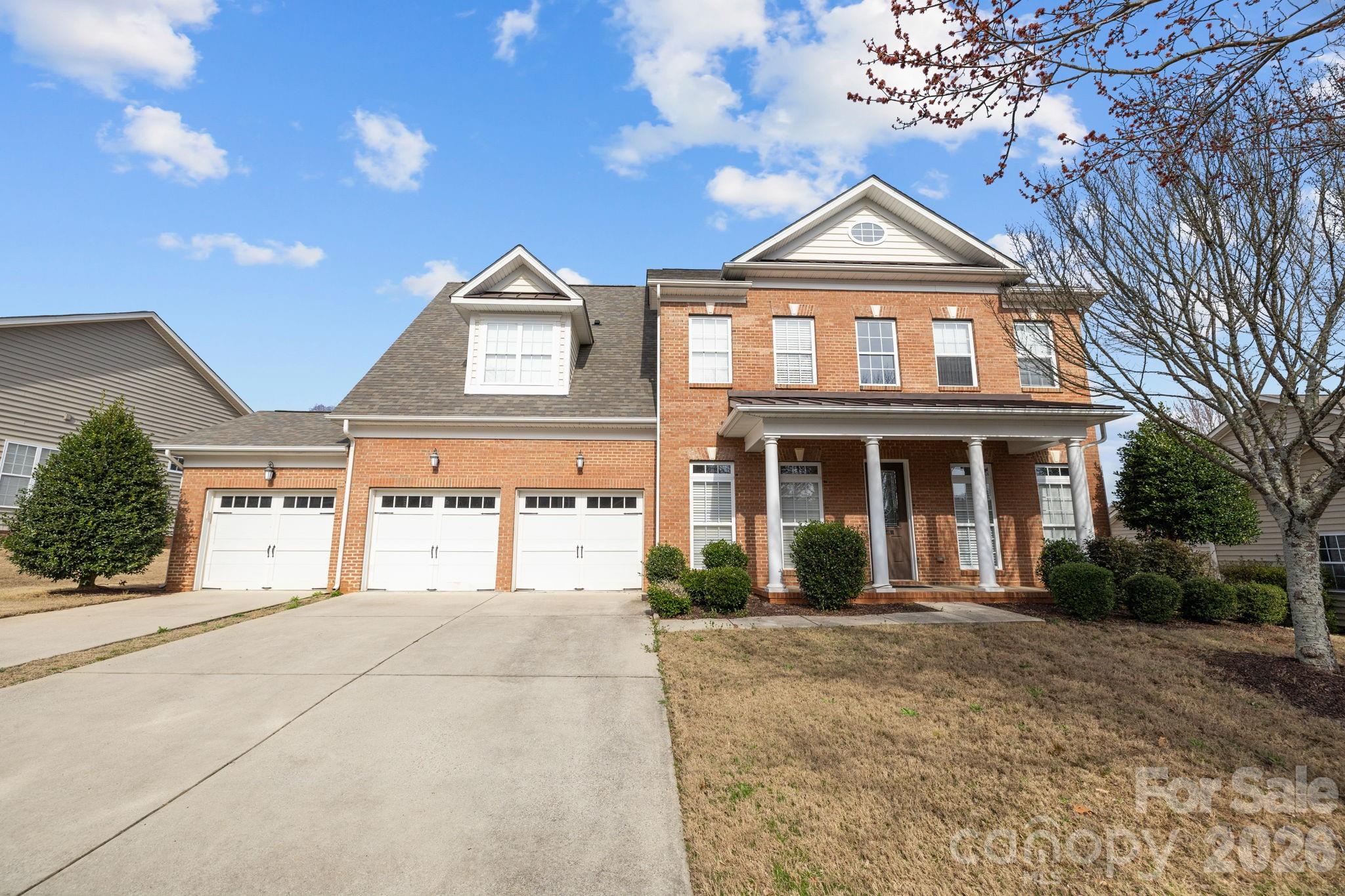 646 Quicksilver Trail Fort Mill, SC 29708 - Photo 44 of 48 a front view of a house with a yard