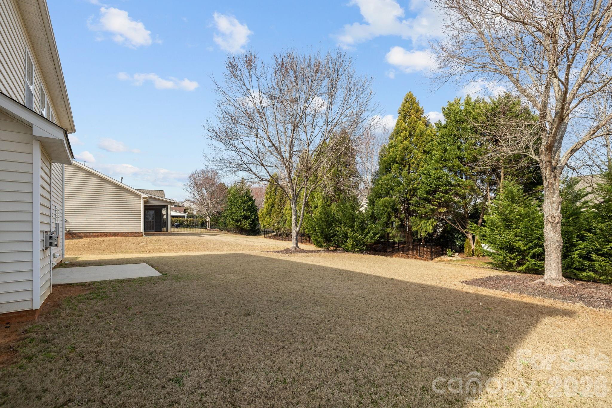 646 Quicksilver Trail Fort Mill, SC 29708 - Photo 48 of 48 a view of a house with a yard and garage
