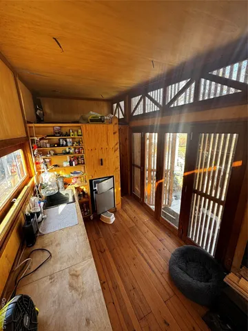 a view of swimming pool with furniture