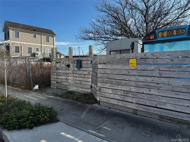 a view of a house with a street