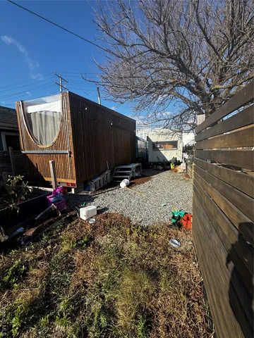 a view of a back yard of the house