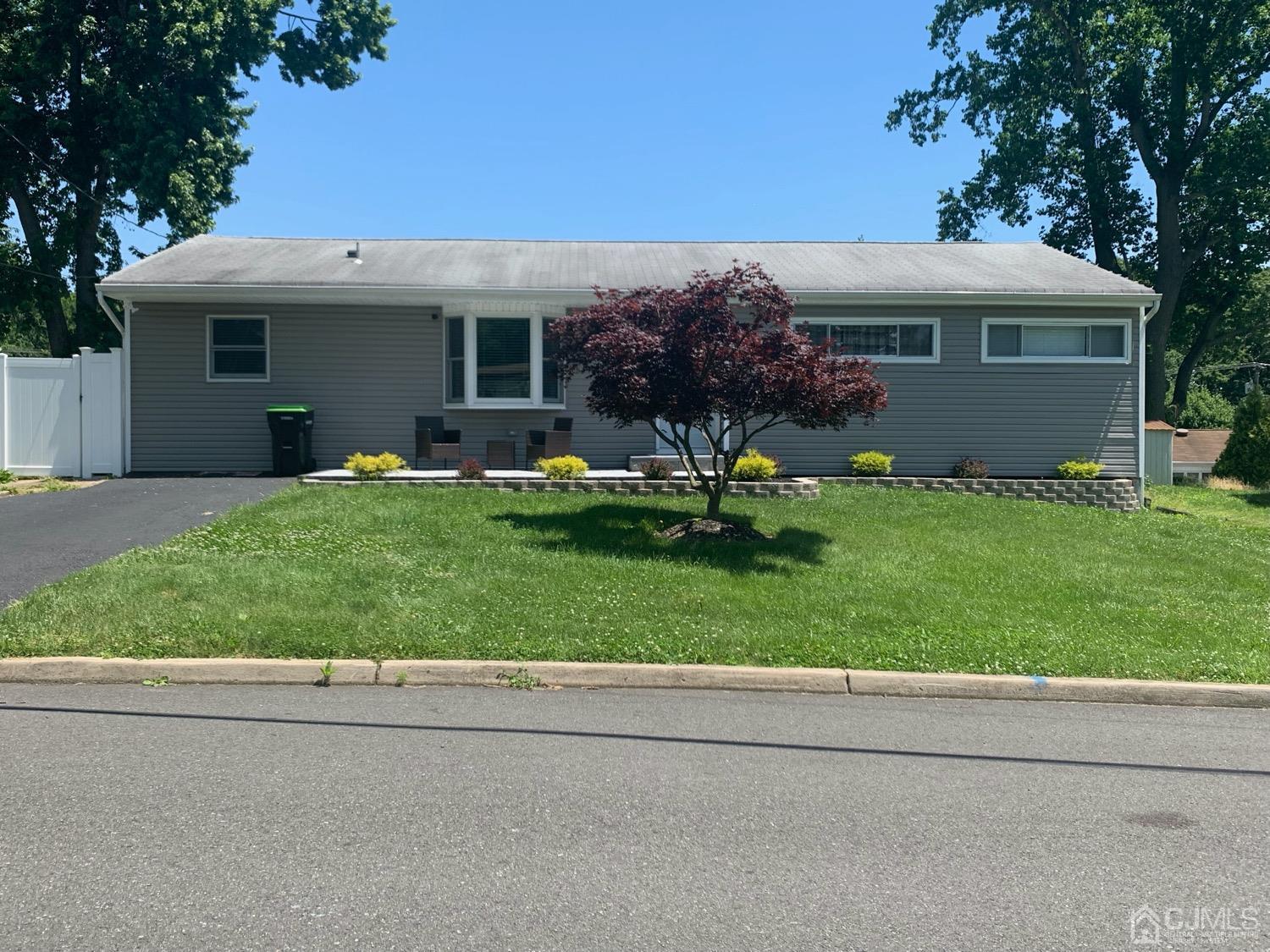 12 Fordham Road Old Bridge, NJ 08859 - Photo 1 of 32 front view of a house with a garden