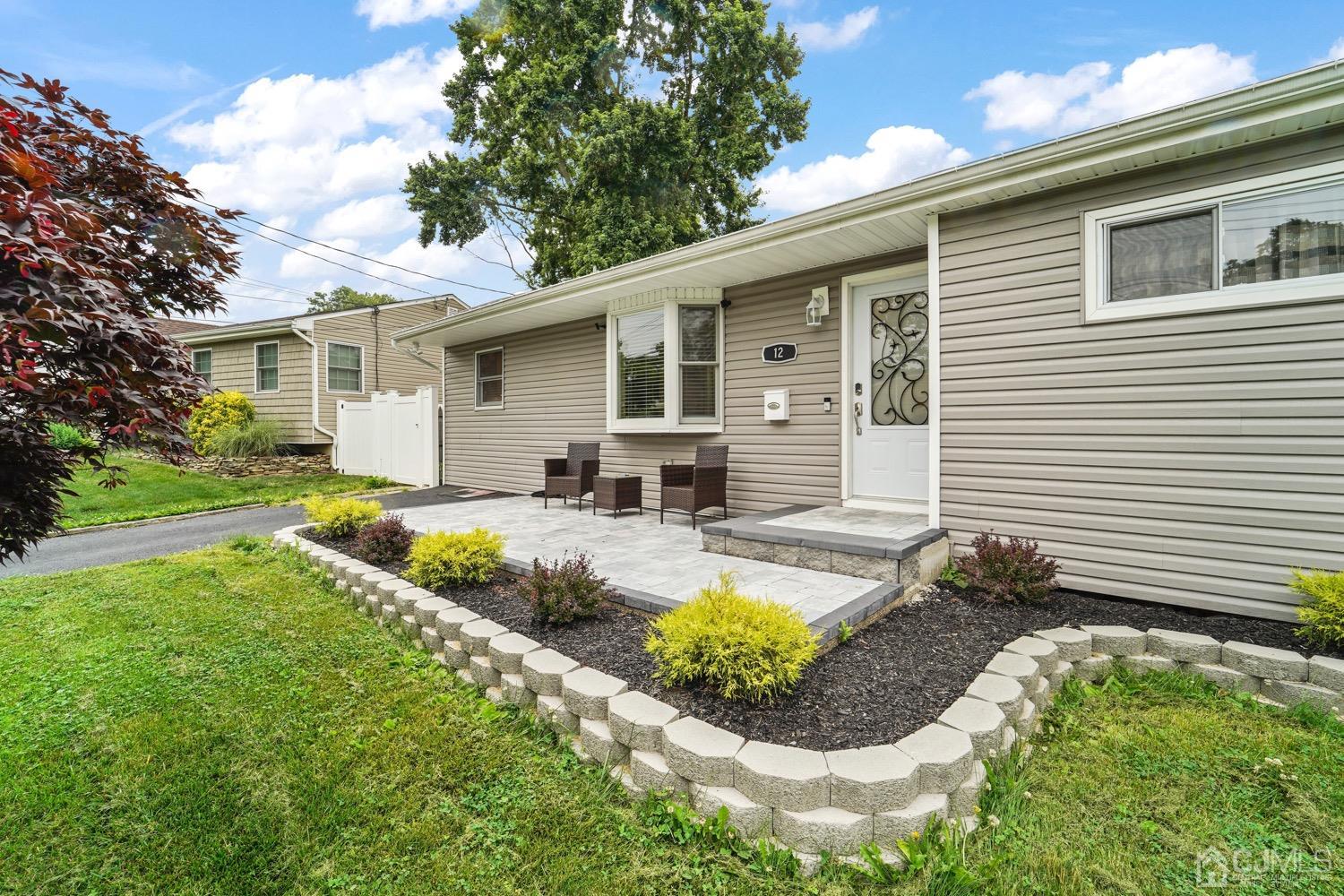 12 Fordham Road Old Bridge, NJ 08859 - Photo 3 of 32 a view of a house with backyard and sitting area