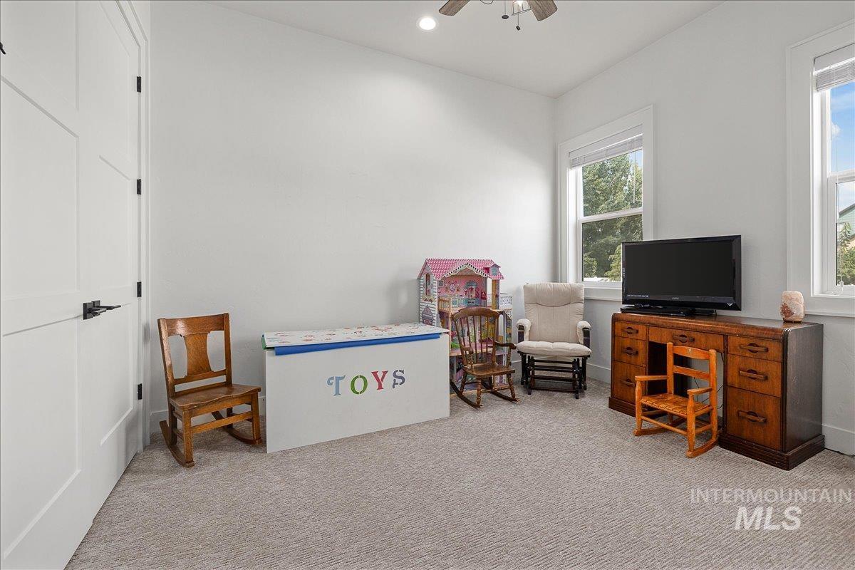 24301 Wanda Way Middleton, ID 83644 - Photo 25 of 50 Carpeted home office with a ceiling fan and recessed lighting