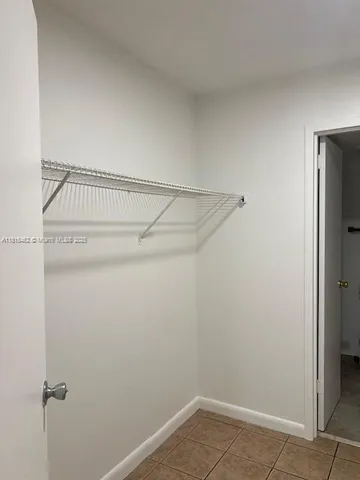 a view of a room with racks on the wall