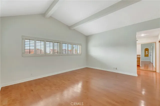 a view of house with backyard space and balcony