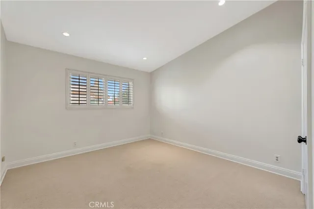 an aerial view of a house with a garden